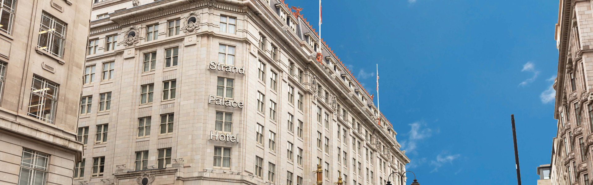 //d337pdvlg6sju5.cloudfront.net/media/images/strand_palace_exterior_hotel_teaser_page_banner.png